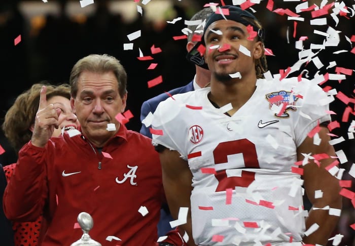 Jalen Hurts of the Alabama Crimson Tide and head coach Nick Saban celebrate thier win after the AllState Sugar Bowl against the Clemson Tigers.