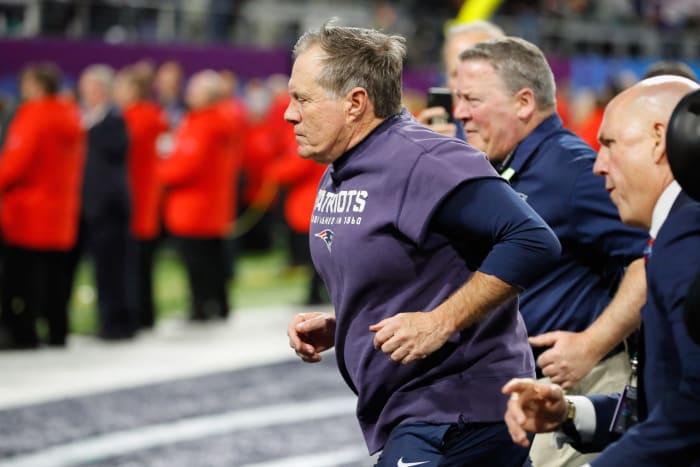 Bill Belichick running off the field.