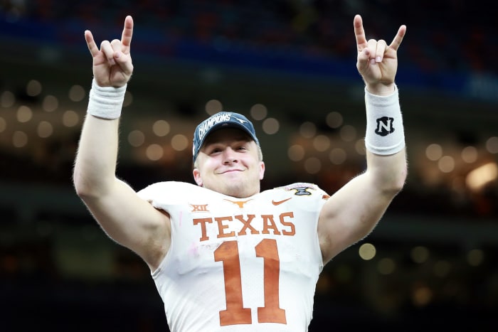 Texas QB Sam Ehlinger celebrating.