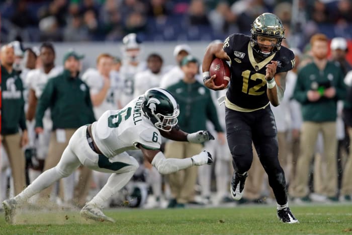 Jamie Newman escapes a Michigan State defender.