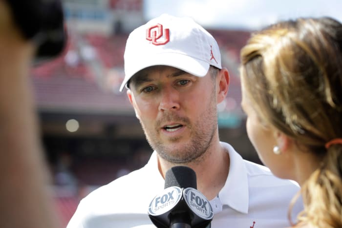 A closeup of Lincoln Riley talking to the media after an Oklahoma football game.