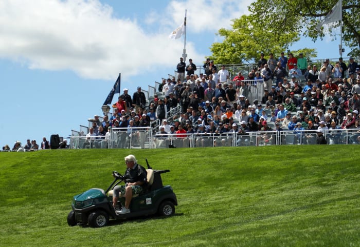 john daly uses a cart at the pga championship