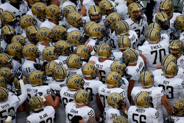 The Pittsburgh Panthers football players gathered together.