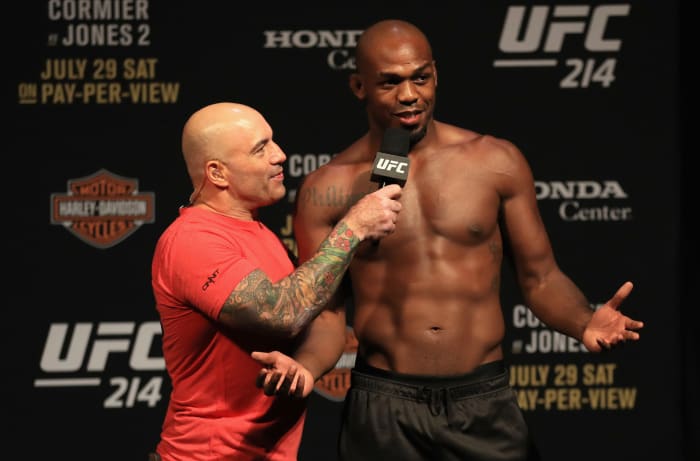 Joe Rogan interviewing Jon Jones during a weigh-in.
