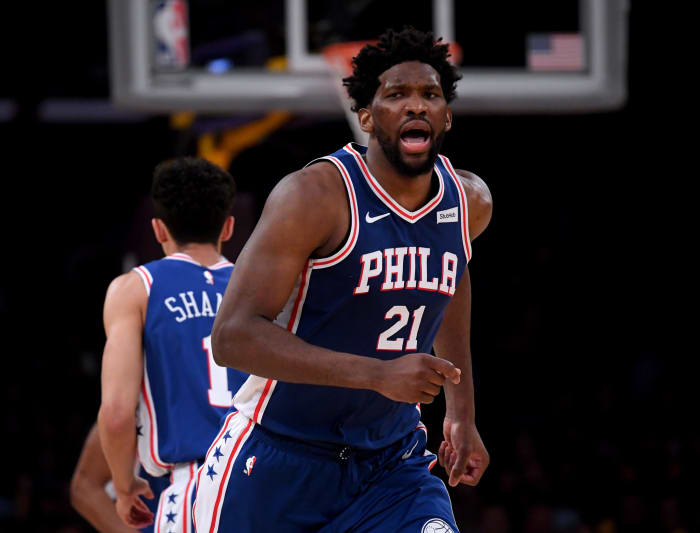 joel embiid yells during an nba game