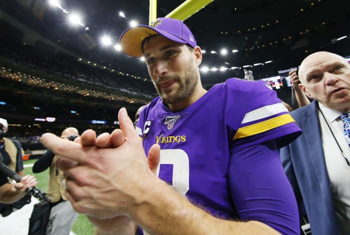 Minnesota Vikings quarterback Kirk Cousins celebrates in overtime.