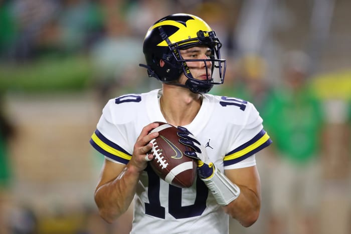 Michigan quarterback Dylan McCaffrey drops back to pass.