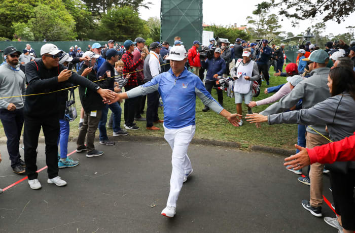 Gary Woodland is greeted by fans at the 2019 U.S. Open at Pebble Beach.