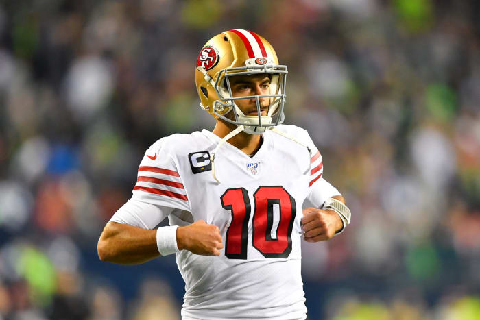 San Francisco 49ers quarterback Jimmy Garoppolo wears a uniform in Seattle.