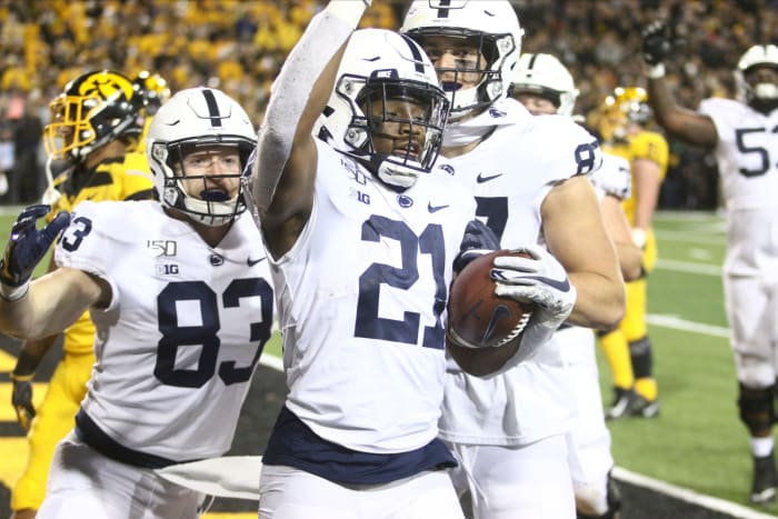 Noah Cain celebrates a touchdown during Penn State vs. Michigan.