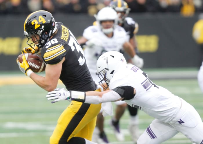 T.J. Hockenson catches a pass for Iowa against Northwestern.