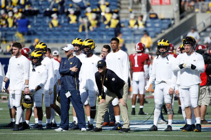 Jim Harbaugh on the sideline before Alabama vs. Michigan.