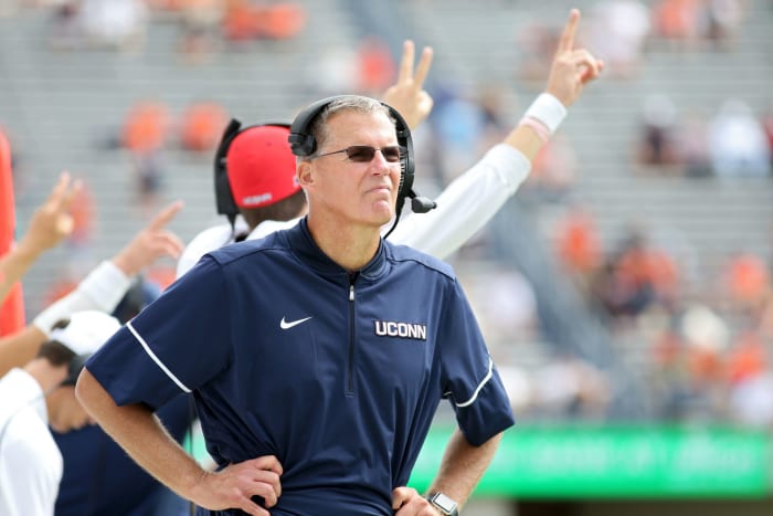 Randy Edsall looks on during a UConn football game.