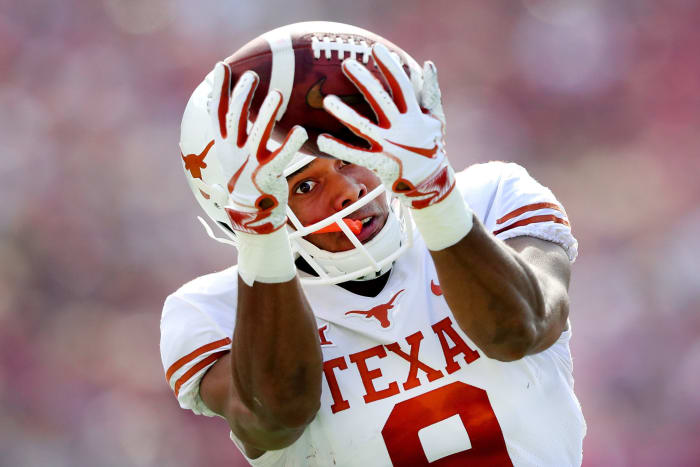 Texas wide receiver Collin Johnson hauls in a pass.