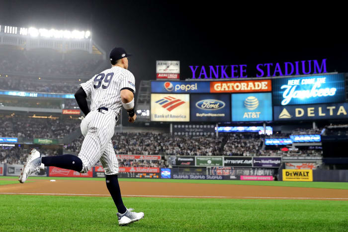 New York Yankees OF Aaron Judge taking the field.