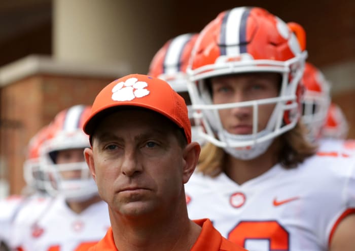Clemson head coach Dabo Swinney looks on sternly in front of his team ahead of an ACC college football game between Clemson football and Wake Forest.