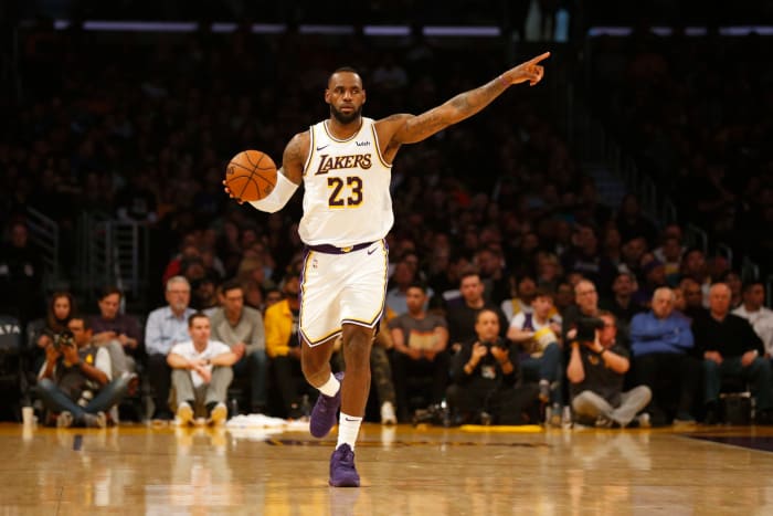 LeBron James dribbles the ball up the floor at STAPLES Center.