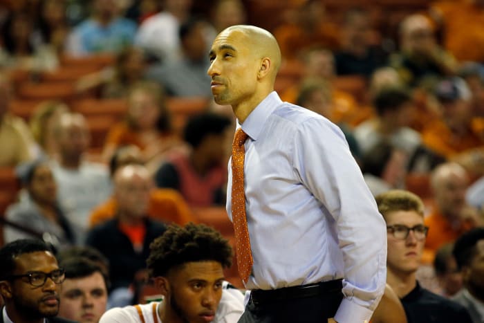 A closeup of Shaka Smart during a Texas Game.