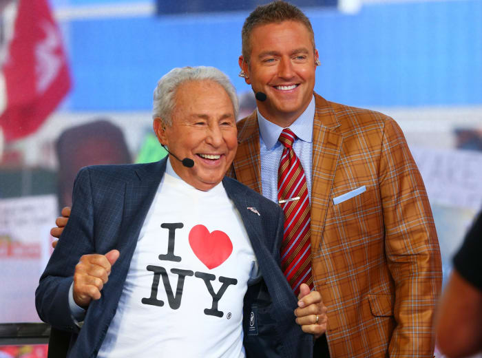 Lee Corso wearing an I Love New York T-Shirt while posing for a photo with Kirk Herbstreit.