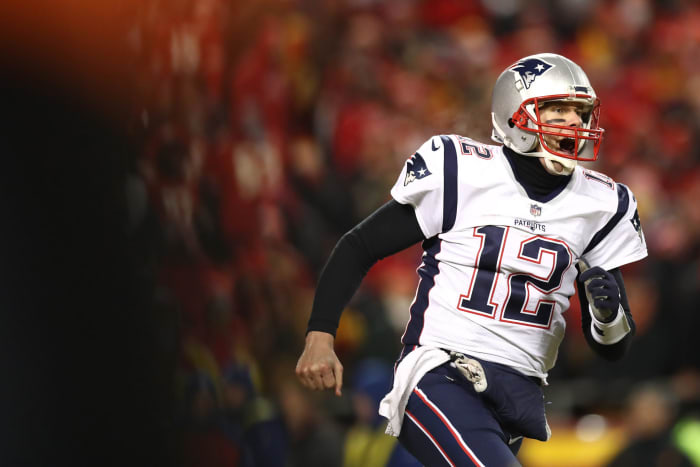 tom brady celebrates winning the afc