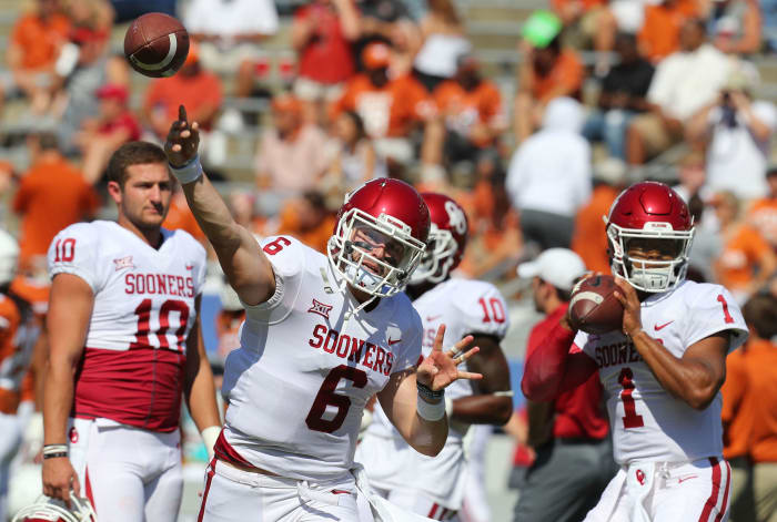 Baker Mayfield and Kyler Murray throwing before an Oklahoma game.