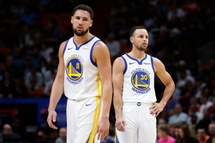 Steph Curry and Klay Thompson on the floor for the Golden State Warriors.