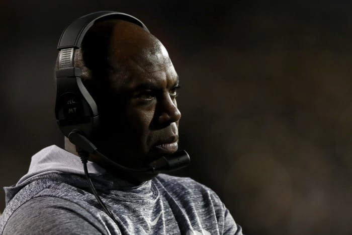 Mel Tucker on the sidelines with a headset on for Colorado.