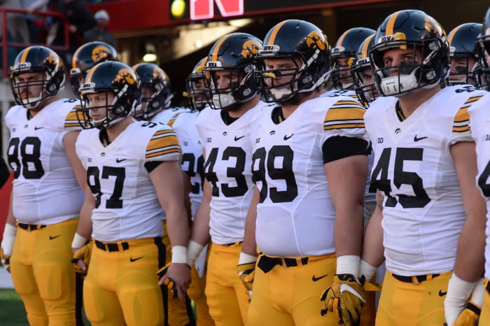 iowa players line up to run onto the field against nebraska