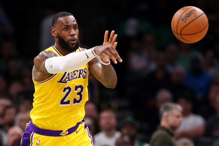 LeBron James passing the ball during a game.