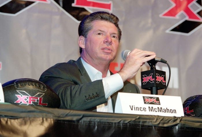 Vince McMahon speaking to the media.