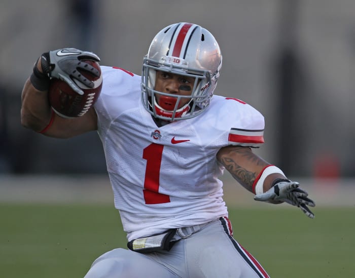 CHAMPAIGN, IL - OCTOBER 15: Dan Herron #1 of the Ohio State Buckeyes runs against the Illinois Fighting Illini at Memorial Stadium on October 15, 2011 in Champaign, Illinois. Ohio State defeated Illinois 17-7. (Photo by Jonathan Daniel/Getty Images)