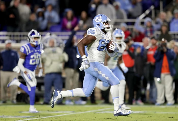 Carl Tucker scores a touchdown for the North Carolina Tar Heels.