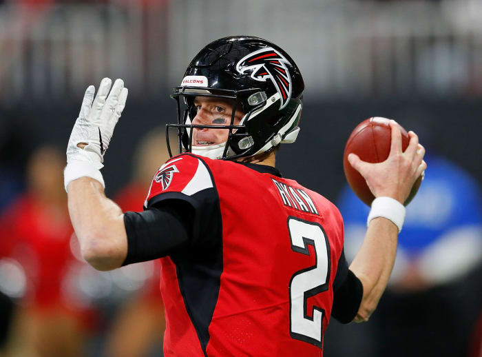 A closeup of Atlanta Falcons QB Matt Ryan throwing a pass.