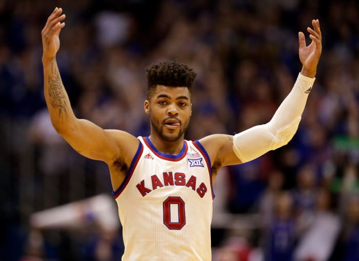 Frank Mason III pumping the crowd up during a game.