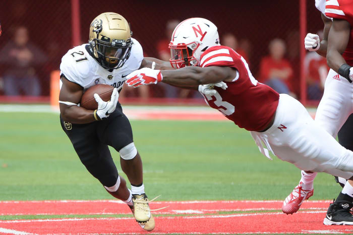 Nebraska player Tyrin Ferguson dives for a tackle during game against Colorado.