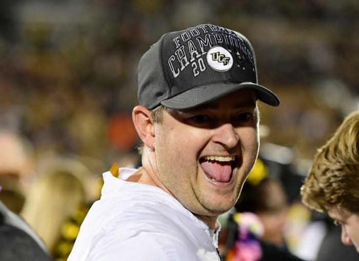 Josh Heupel celebrates AAC title win.