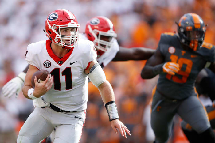 Jake Fromm running the football for Georgia.