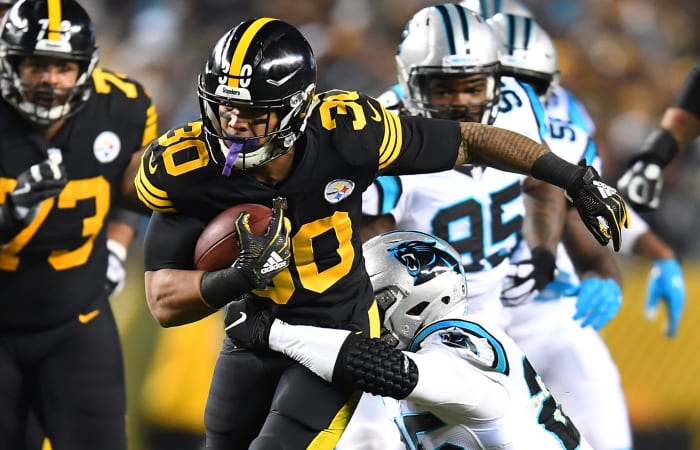 James Conner running the football against the Panthers.