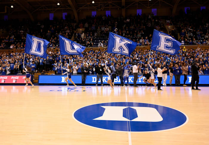Duke basketball cheerleaders performing during a game.