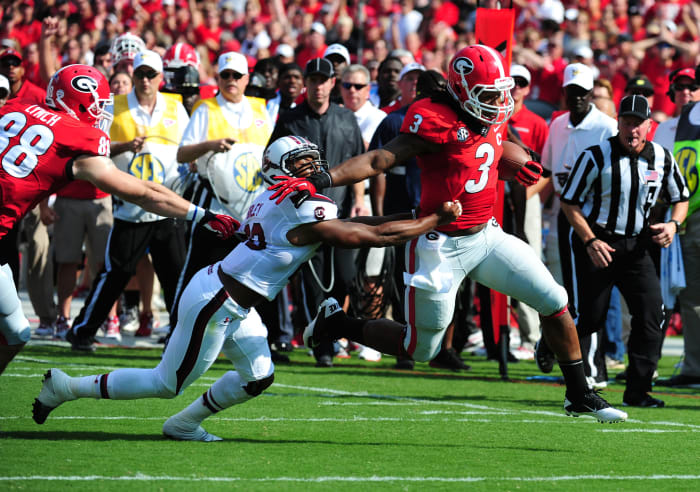 Todd Gurley of Georgia runs past a defender.