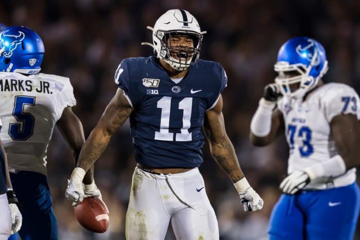 Penn State linebacker Micah Parsons reacts to making a tackle.