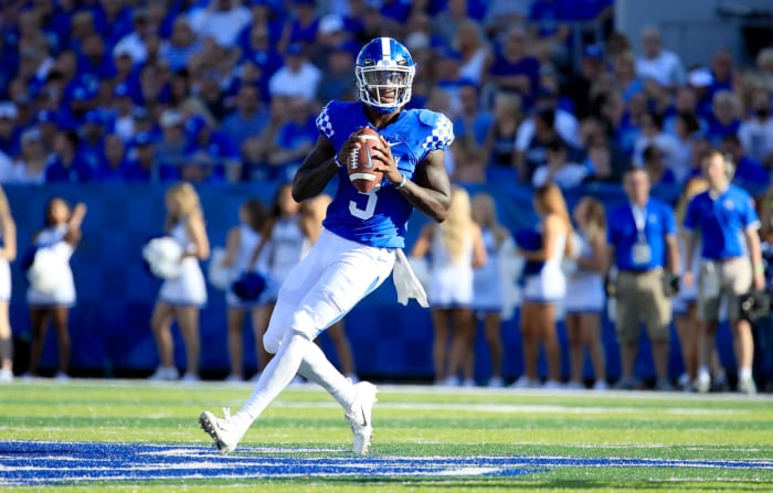 Terry Wilson throwing a pass for Kentucky football vs. CMU.