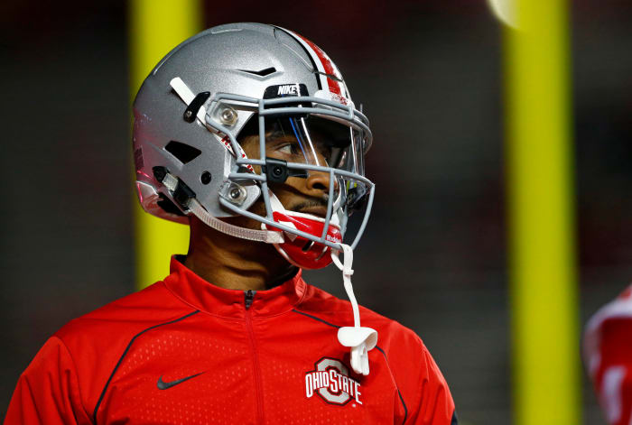 Braxton Miller wears his helmet during warm-ups at Rutgers.