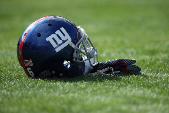 A picture of the New York Giants helmet on the field.