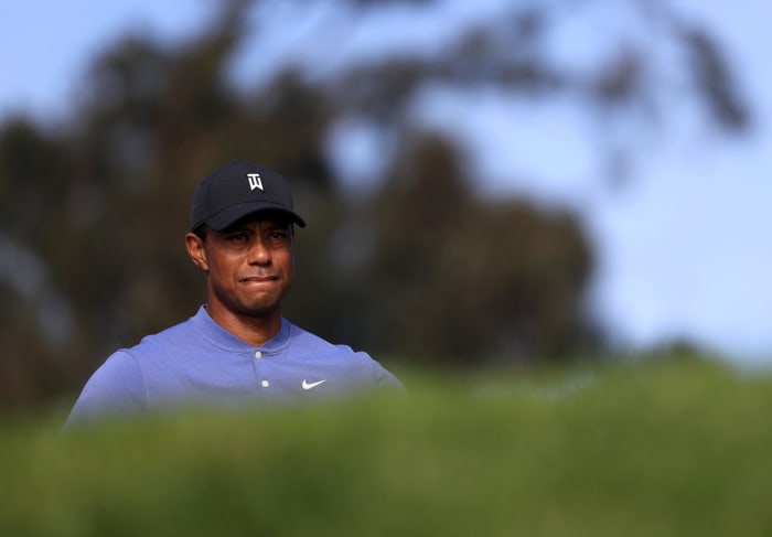Tiger Woods competes in the first round of the Farmers Insurance Open.