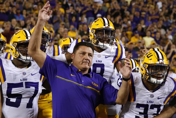 Ed Orgeron prepares to lead LSU onto the field.