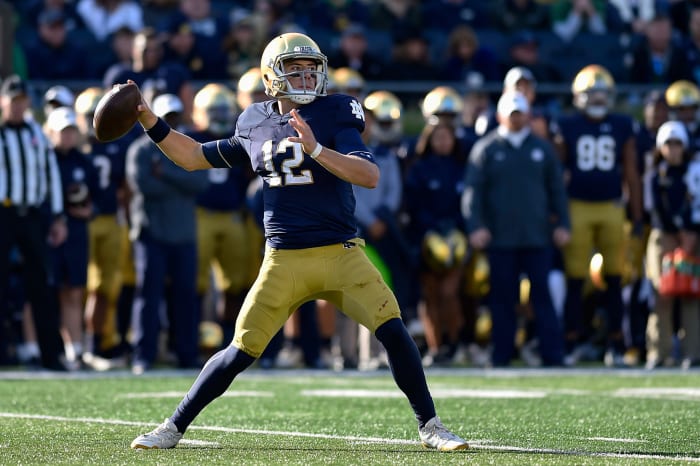 Ian Book attempts a pass for the Notre Dame Fighting Irish.