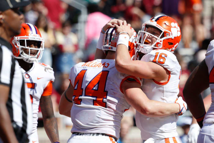 Trevor Lawrence celebrates touchdown with Garrett Williams.