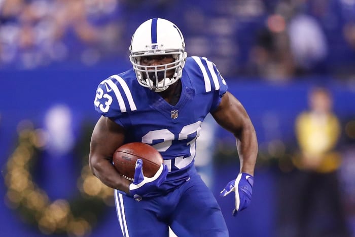 Frank Gore carrying the ball for the Colts.