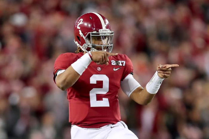 Quarterback Jalen Hurts of the Alabama Crimson Tide celebrates after a touchdown.